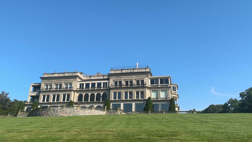 Majestic stone manor on Lake Geneva, sunny day, peaceful setting