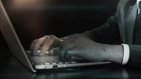 Close-up of a businessman using a laptop with a holographic interface, representing innovation, technology, and modern digital business solutions. - Powered by Shutterstock - Get 15% off with code: PIKWIZARD15