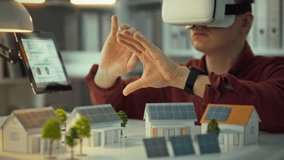 A person wearing virtual reality goggles is interacting with a digital environment that showcases miniature models of houses - Powered by Shutterstock - Get 15% off with code: PIKWIZARD15