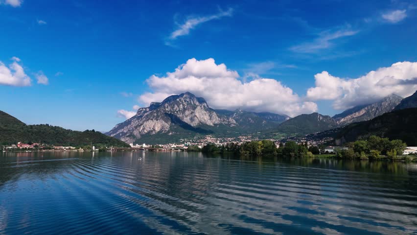 Fly up towards Lecco, view of Monte Coltignone, Lake Garlate and more