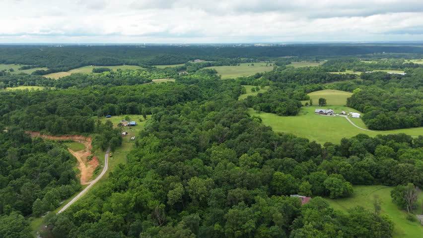 Architectures At Rural Landscape With Dense Forests In Siloam Springs, Arkansas, United States. Aerial Drone Shot