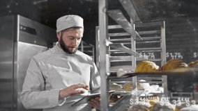 Camera view of handsome Caucasian male working at pastry factory. Holding tablet device with one hand while counting completed orders. Digital holographic prices floating above tasty bread. - Powered by Shutterstock - Get 15% off with code: PIKWIZARD15