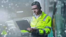 Caucasian male engineer in reflective jacket and headset using laptop in industrial environment. Digital holographic data floating around. Representing smart factory communication and monitoring. - Powered by Shutterstock - Get 15% off with code: PIKWIZARD15