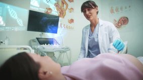 Female doctor in lab coat performing ultrasound examination on pregnant woman. Holographic medical projections showing fetal scan and genetic data in bright clinic. Medical technology concept. - Powered by Shutterstock - Get 15% off with code: PIKWIZARD15