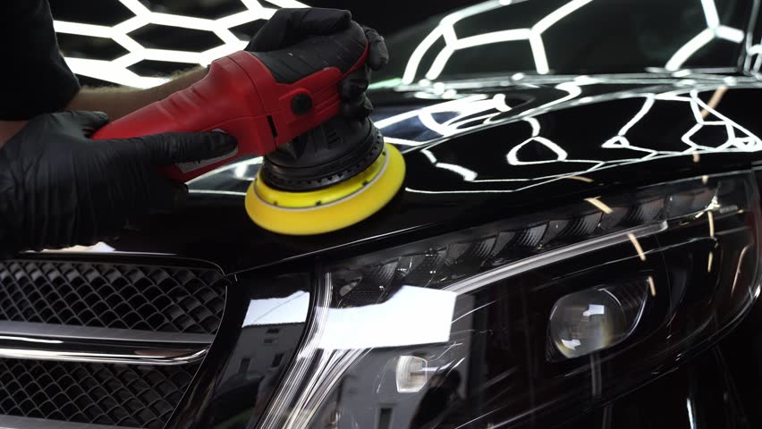Car Paint Polishing 4k video. Car detailing polishing restores surface clarity and maximizes gloss. Automotive polishing improves car surface reflection.