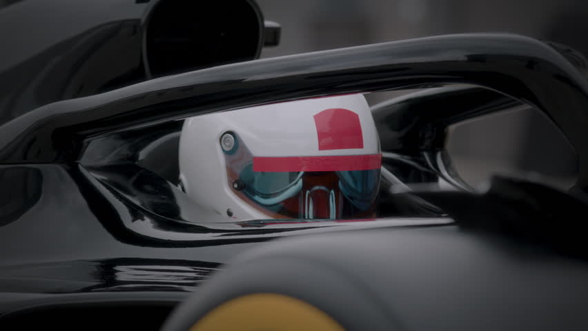 Close-up of a focused pilot driver in a red racing car, wearing a helmet, preparing for a high-speed race