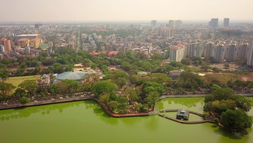  Futuristic aerial view panorama of developing Yangon city , Aerial view of Sule pagoda in downtown, Yangon, Myanmar. Sule Pagoda located in the heart of Yangon, Karaweik royal barge, Kandawgyi Lake, 