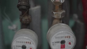 Water consumption meter. Close-up of the water usage counter. Household water usage. - Powered by Shutterstock - Get 15% off with code: PIKWIZARD15