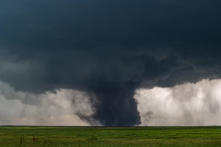 Lightning and a Tornado | Kimball, Nebraska - Timelapse of a dusty tornado with several cloud to ground bolts striking nearby.