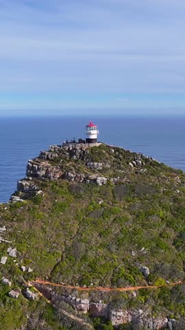 Cape Point Lighthouse At Cape Town in South Africa. Table Mountain National Park. Famous Cape Point. Cape Town South Africa. Tourism Travel. Paradisiac Skyline. Tourism landmark. Coastal landscape.