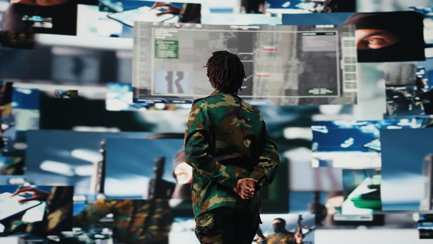 Air defense commander using radar systems digital interface to detect incoming ballistic missiles. Portrait of army soldier with arms crossed in base of operations scanning enemy rockets, camera A - Powered by Shutterstock - Get 15% off with code: PIKWIZARD15