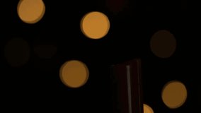 Metal lighter flame touching wick, igniting flame and colored smoke swirling upward for warm glow. Candles, flames, illumination, ambiance, glow, artistry, contrast - Powered by Shutterstock - Get 15% off with code: PIKWIZARD15