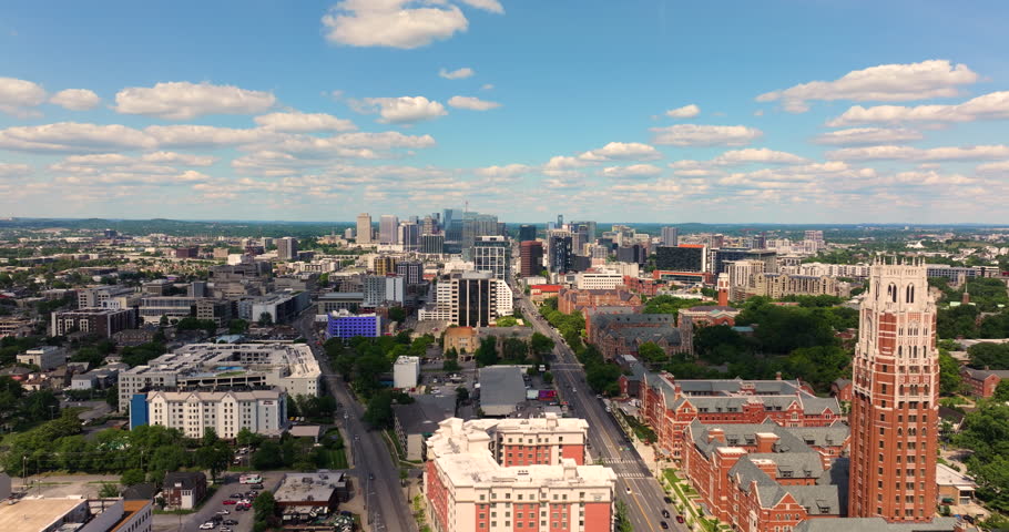 Downtown district of Nashville city in Tennessee, USA. Urban landscape of high-rise buildings in developing American metropolitan area.