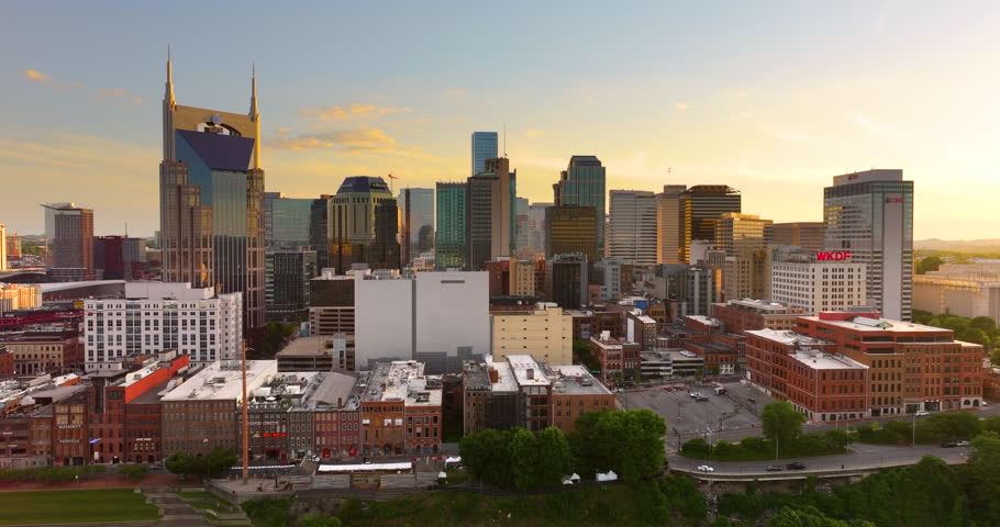 Nashville city urban environment in Tennessee, USA. Evening view from above of skyscraper buildings in downtown district. American metropolitan area with business financial district.