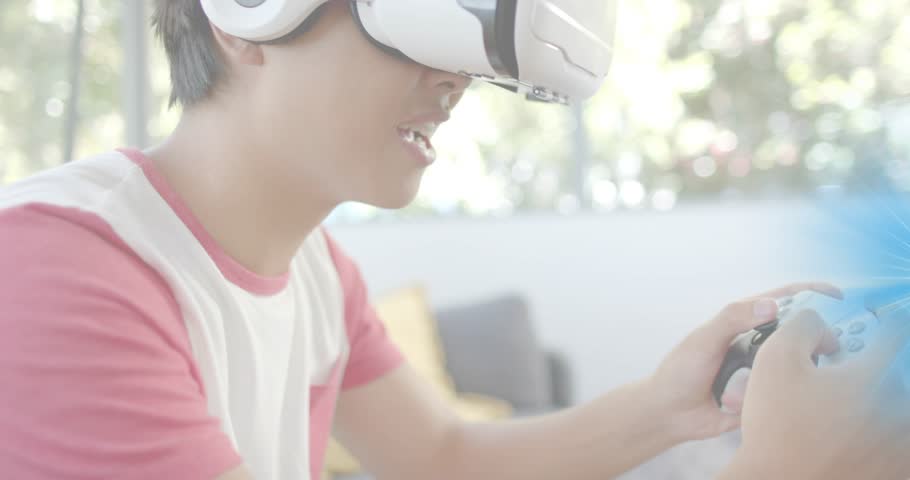 Man in VR headset using controller pressing triggers, leaning and engaging UI with blue particles. Immersive, technology, innovation, entertainment, digital, futuristic, relaxation