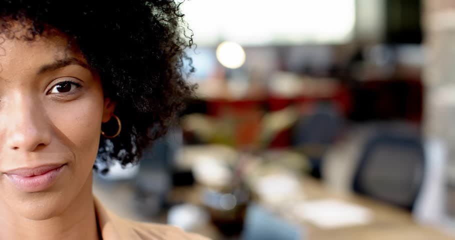 Woman in office grinning brighter initiating glowing formulas emerging midair for science education. Innovation, education, collaboration, inspiration, creativity, professionalism, modern