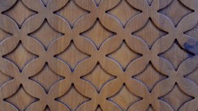 Unique geometric wood carving patterns with overlapping circles and diamond shapes. - Powered by Shutterstock - Get 15% off with code: PIKWIZARD15