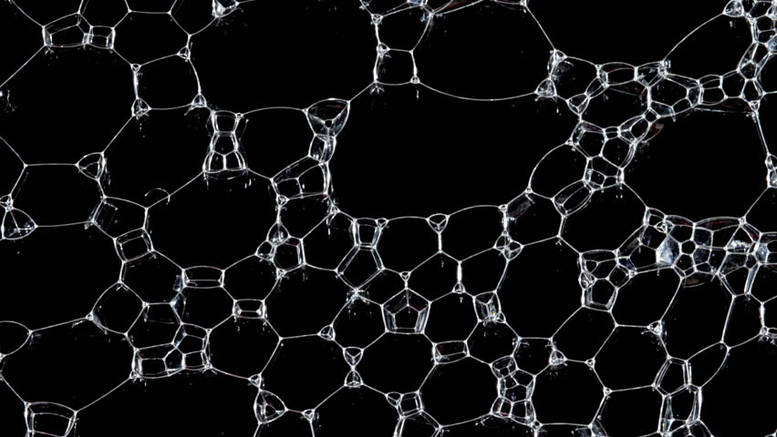 Texture of white soap foam with bubbles abstract background. Soap sud macro structure. Bathtup Soap Foam. Natural White Shampoo Bubbles Motion.