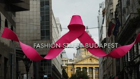 Stylish Fashion Street in Budapest filled with boutiques, elegant storefronts, under bright daylight in the city centre. - Powered by Shutterstock - Get 15% off with code: PIKWIZARD15