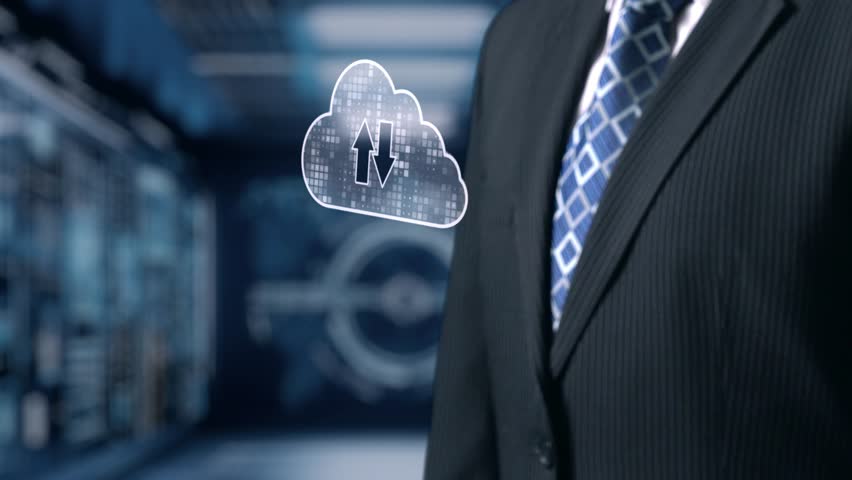 A businessman stands alongside a digital cloud storage concept, illustrating the importance of data management and file sharing in a professional office environment. Qubit - Powered by Shutterstock - Get 15% off with code: PIKWIZARD15