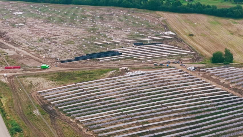 Renewable energy transition solar farm construction site Europe aerial drone
