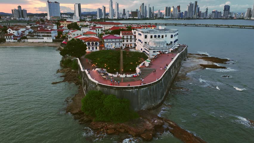 Drone shot of Las Bobedas in Panama's Old Town as it zooms out and reveals the city and Ancon Hill