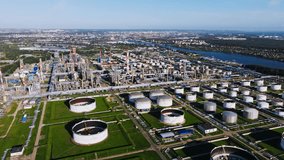 Large oil refinery with fuel storage tanks, industrial facilities in Europe - Powered by Shutterstock - Get 15% off with code: PIKWIZARD15