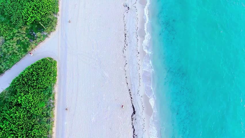 Aerial Miami Beach shoreline with turquoise Atlantic waves