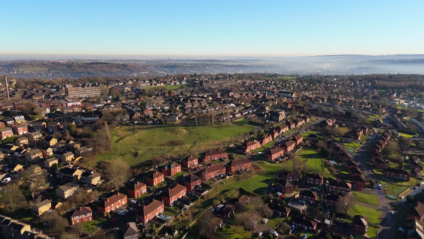 Urban housing in Yorkshire UK. Council houses on town estate, winter morning in a busy city. Dewsbury moor and th town of Heckmondwike