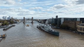London ,HMS Belfast moored on river Thames Tower bridge in background ,aerial - Powered by Shutterstock - Get 15% off with code: PIKWIZARD15