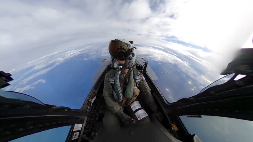 Cockpit POV of Fighter Pilot with F-15 and F-35 Formation in the Sky