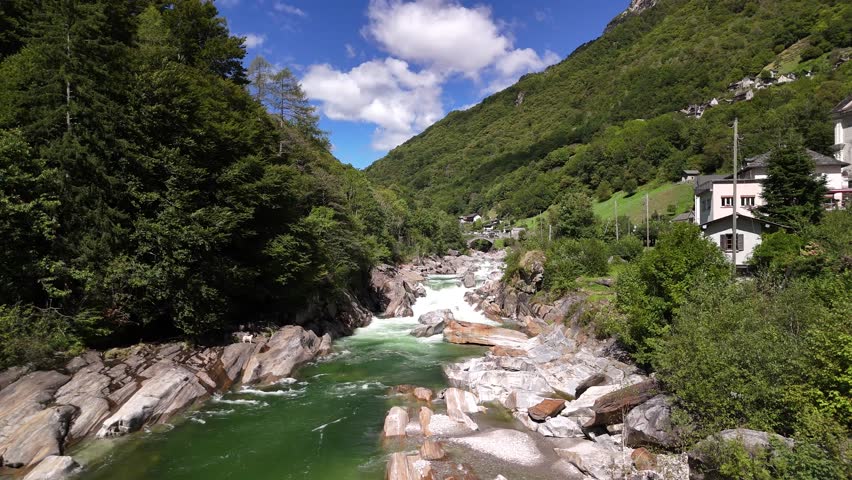 Switzerland Verzasca Valley river, aerial drone over nature landscape forest