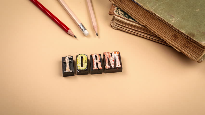 Vintage wooden letters forming the word farm with old books and pencils on beige background, education and creativity concept  