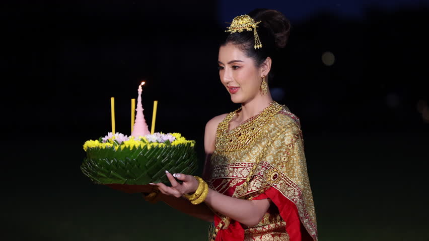 Loy Krathong Traditional Thai Festival, Thailand, Thai woman wearing thai traditional dresses costume hold kratong, Asia woman in Thai dress traditional hold kratong.