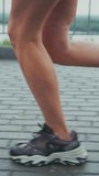 Dynamic Running Footage Focused on Athletic Footwear in Motion Capturing the Essence of Sport and Movement on a Paved Surface Outdoors - Powered by Shutterstock - Get 15% off with code: PIKWIZARD15