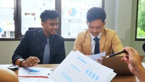 Confident professionals discussion on data charts during business meeting - Powered by Shutterstock - Get 15% off with code: PIKWIZARD15