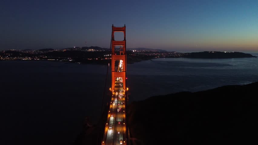 beautiful night view of the sea and bridge that connet roads