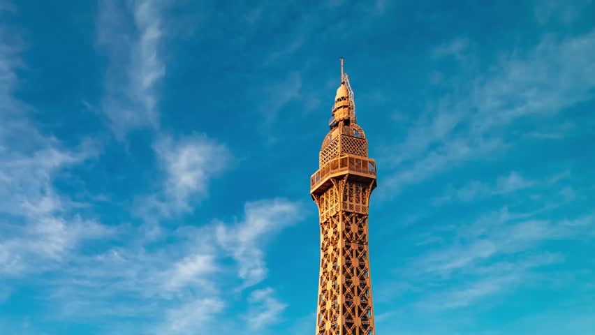 Close-up view of the Eiffel Tower Restaurant at Paris Hotel and Casino in Las Vegas, USA, showing vibrant nightlife and iconic city atmosphere.
