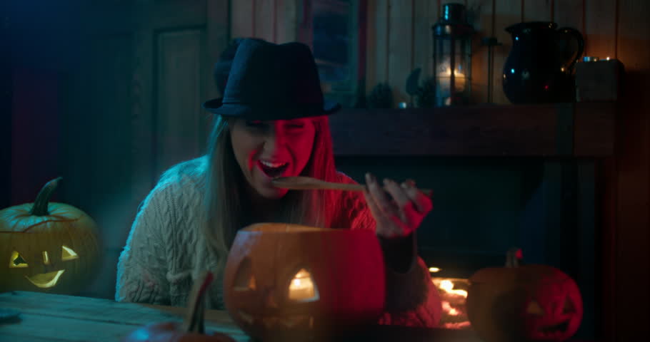 Beautiful Witch Brewing Magical Pumpkin Soup on Halloween Night | 4K, 12 Bit Braw Video