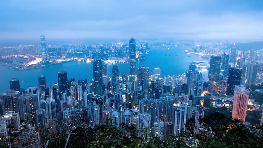 Hong Kong skyline view from Victoria Peak at dusk showing skyscrapers and harbor