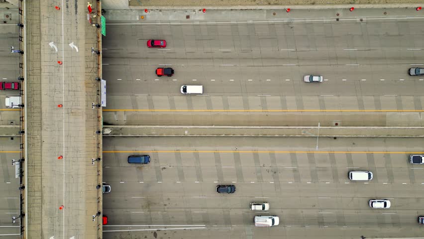 Traffic Overhead of an Interstate with a Bridge | Road Repairs Concept in a Downtown Urban City | Drone Flyover looking down at a highway with cars passing | St. Paul Minnesota I94