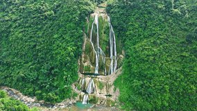 Aerial view of flowing waterfalls and green forest natural landscape in Guizhou, China. - Powered by Shutterstock - Get 15% off with code: PIKWIZARD15