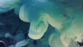 Cracked light bulb. Vapor blue paint. Defocused vibrant color fluid splash smoke cloud filling cracked glass in water on abstract dark black background. - Powered by Shutterstock - Get 15% off with code: PIKWIZARD15