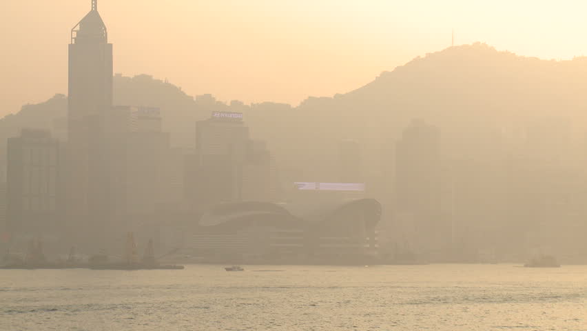 Smog Pollution Sunset Over Asia Megacity Hong Kong. Air pollution and choking
