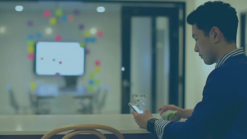 Animation of network of people icons and data over man using smartphone in casual office. Network, data, digital interface, business and global communication, digitally generated video. - Powered by Shutterstock - Get 15% off with code: PIKWIZARD15