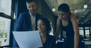 Analyzing global data with digital map overlay, business professionals in office. Technology, collaboration, teamwork, analysis, innovation, strategy - Powered by Shutterstock - Get 15% off with code: PIKWIZARD15