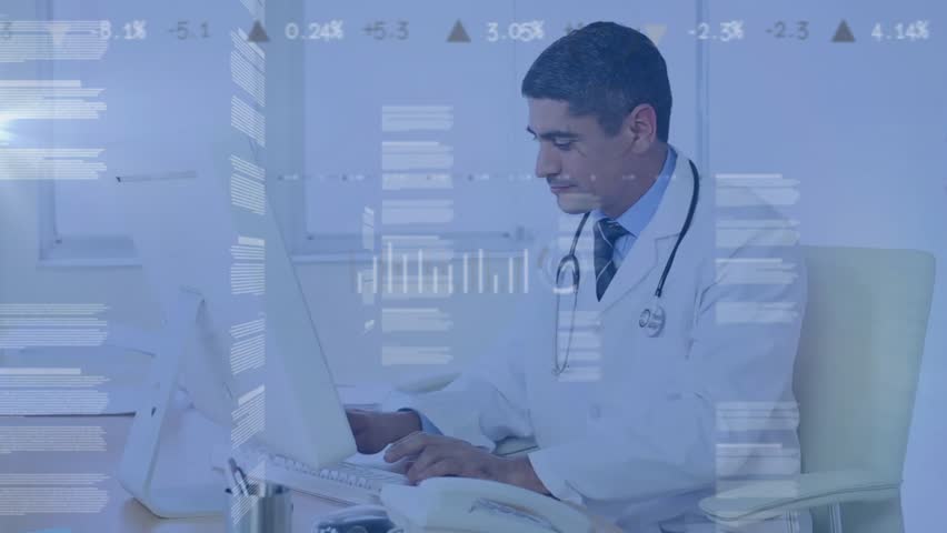 Male doctor sitting at desk typing on laptop in medical office, showcasing floating health charts. Healthcare, telemedicine, digital health, informatics, professional, technology, analysis - Powered by Shutterstock - Get 15% off with code: PIKWIZARD15