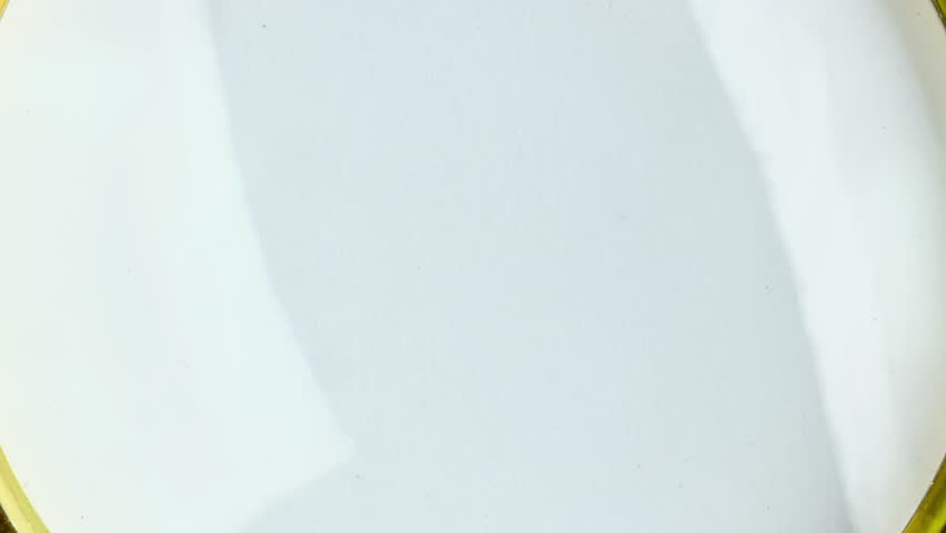 Observe a magnifying glass focusing on Just Start written on a notepad beside a pen and calculator, emphasizing business beginnings and planning - Powered by Shutterstock - Get 15% off with code: PIKWIZARD15