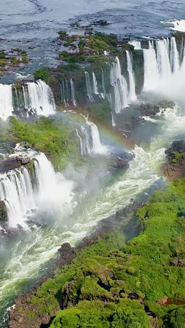 Iguazu Waterfalls At Foz Do Iguacu In Parana Brazil. Waterfalls Flowing. Nature Landscape. Parana Brazil. Summer Travel. Iguazu Waterfalls At Foz Do Iguacu In Parana Brazil.