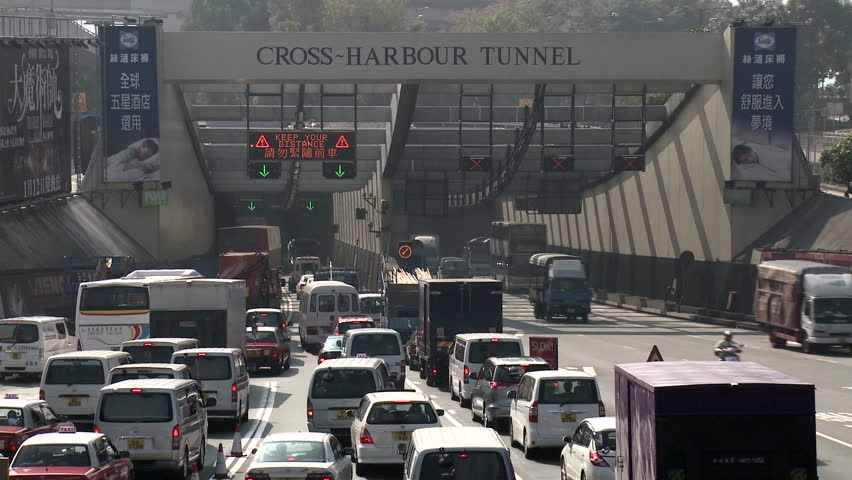 HONG KONG, CHINA - FEBRUARY 2012: Gridlock Traffic Entering Road Tunnel shot in